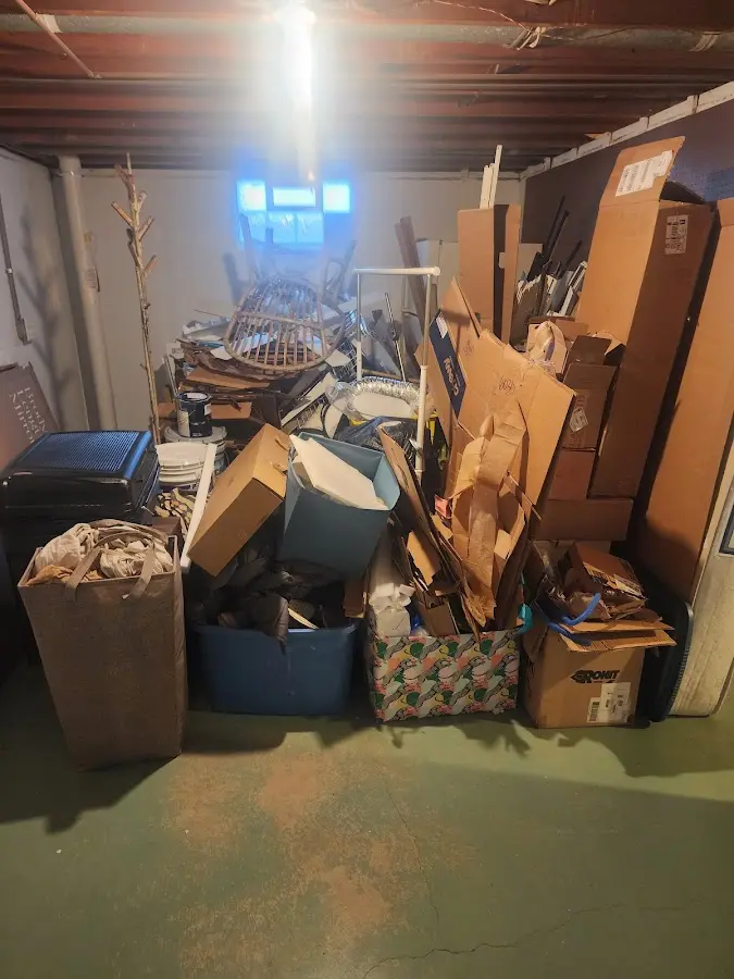 Roll-off dumpster container at job site for 8 Yard Dumpster Rental in Estes Park